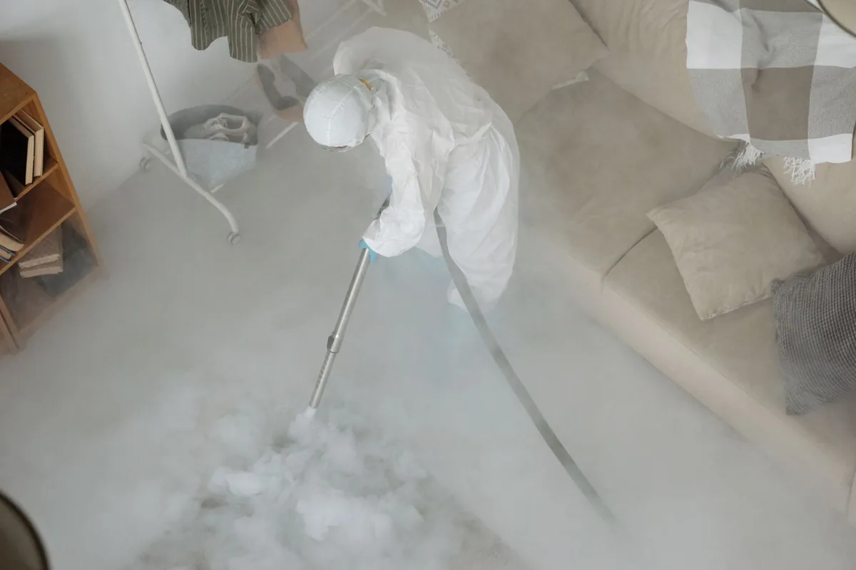 Biohazard cleanup technician in protective equipment, Cudjoe Key, FL